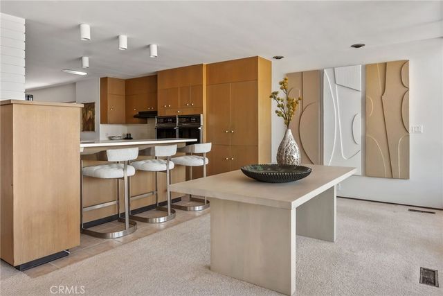 an aerial view of a city with ocean view