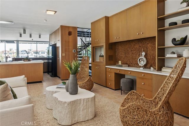 an aerial view of a city with ocean view