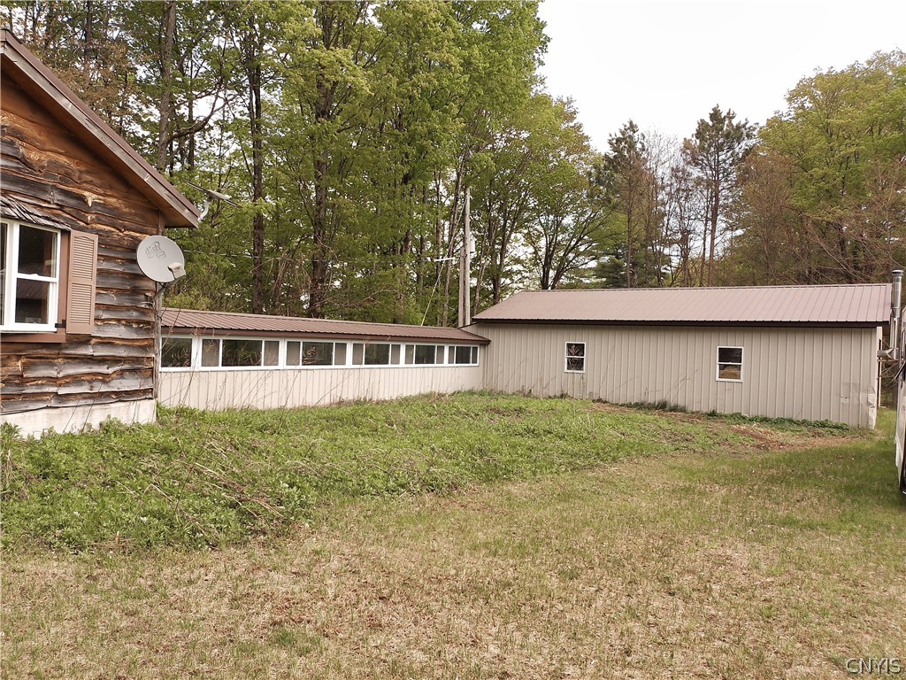 158 Mac Arthur Road Russia, NY 13324 - Photo 3 of 50 Long enclosed breezeway connects garage to cabin