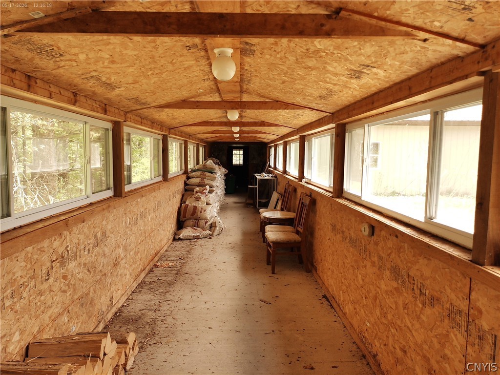 158 Mac Arthur Road Russia, NY 13324 - Photo 37 of 50 Breezeway to main cabin. 2 tons of pellets includ