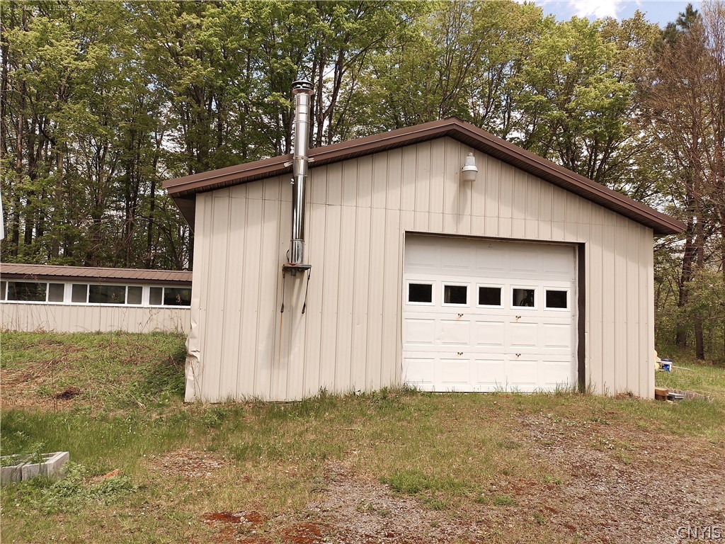 158 Mac Arthur Road Russia, NY 13324 - Photo 5 of 50 Large 24' x 50' insulated garage with electric and