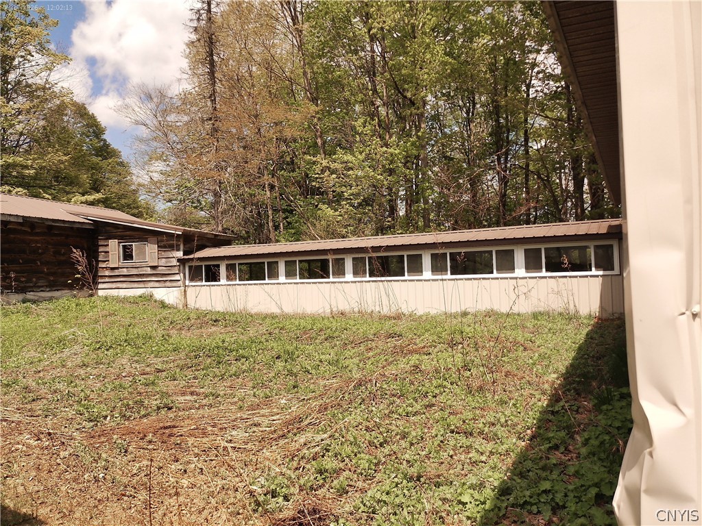 158 Mac Arthur Road Russia, NY 13324 - Photo 8 of 50 Many double pane vinyl windows on both walls of th