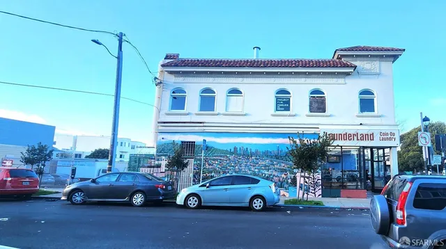 a car parked in front of a building