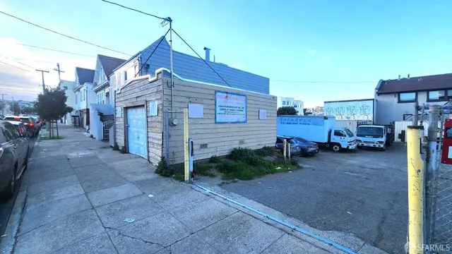 a car parked in front of a house