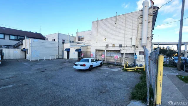 a view of a street with cars