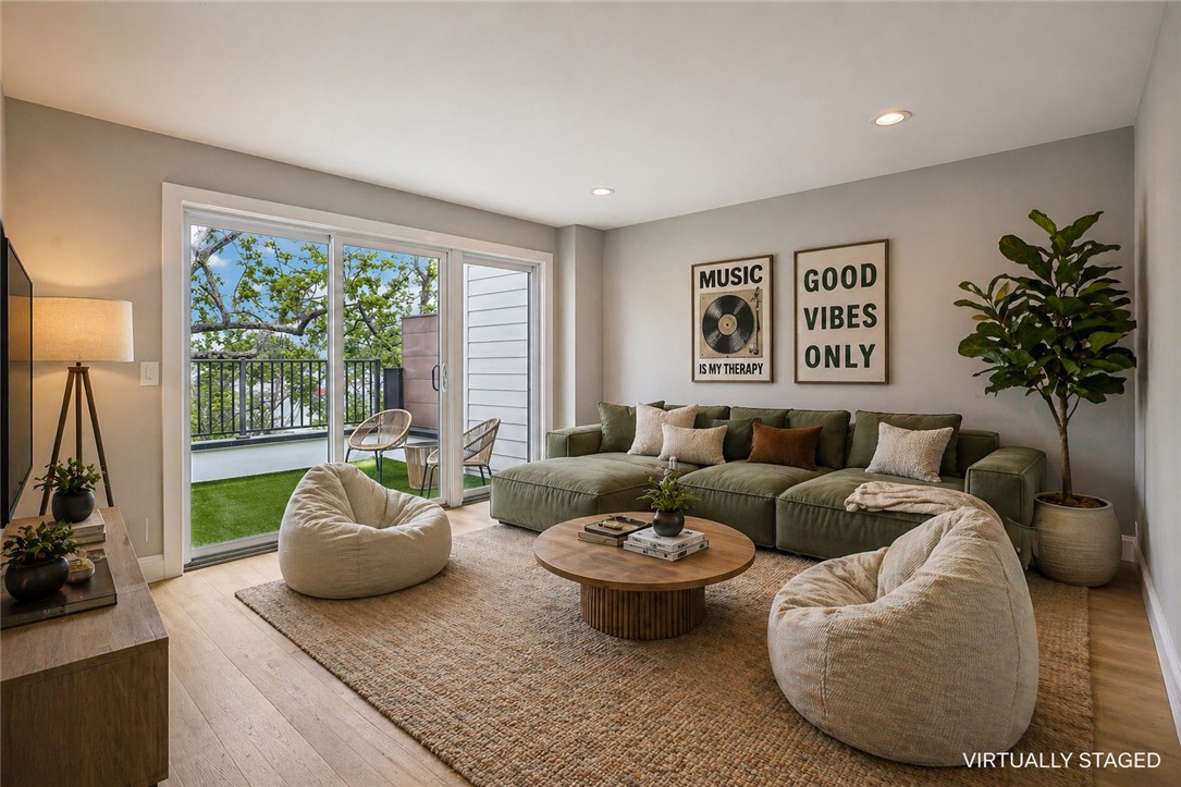 3906 Edwards Road, Unit C Cincinnati, OH 45209 - Photo 37 of 46 Bright and open living area with direct access to an outdoor oasis.