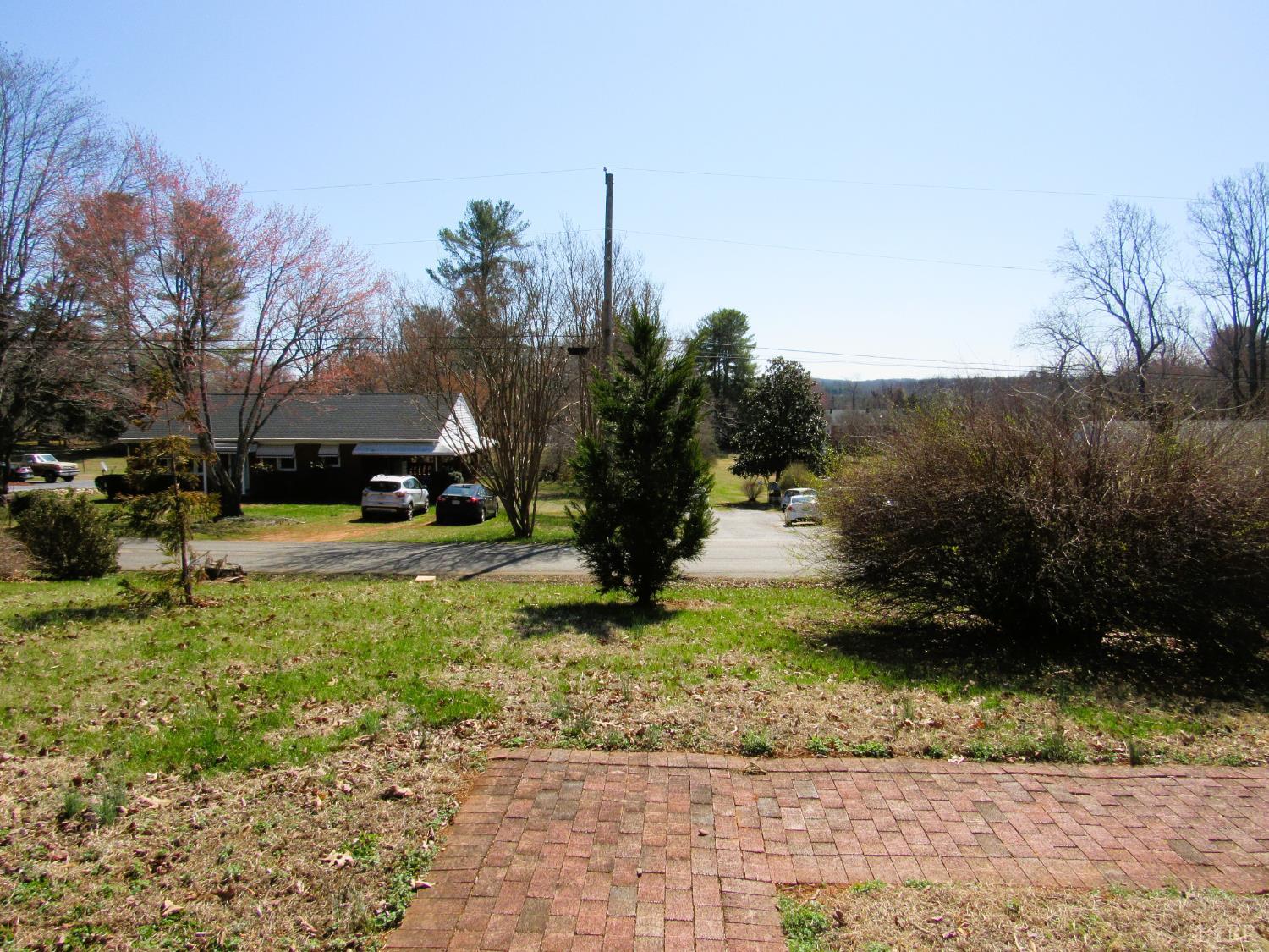 144 Maple Lane Amherst, VA 24521 - Photo 27 of 29 a view of a garden with a fountain