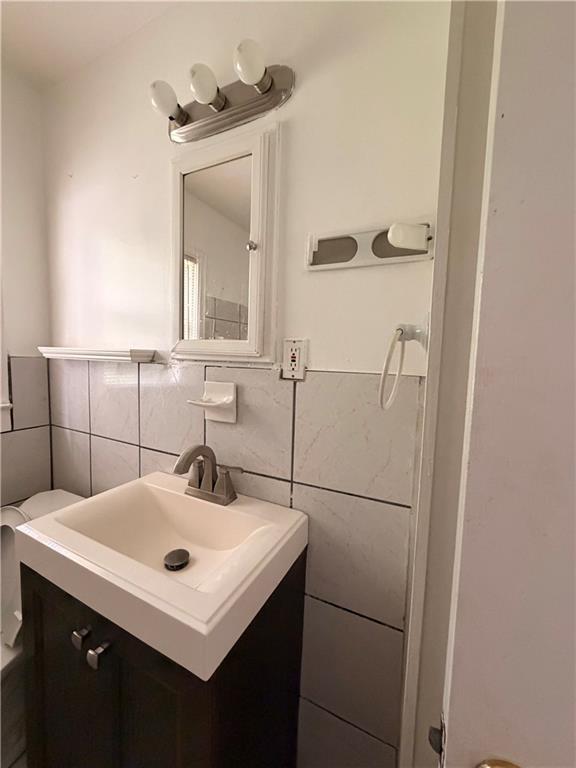 3151 Bluebird Lane Decatur, GA 30032 - Photo 11 of 16 a bathroom with a sink and mirror