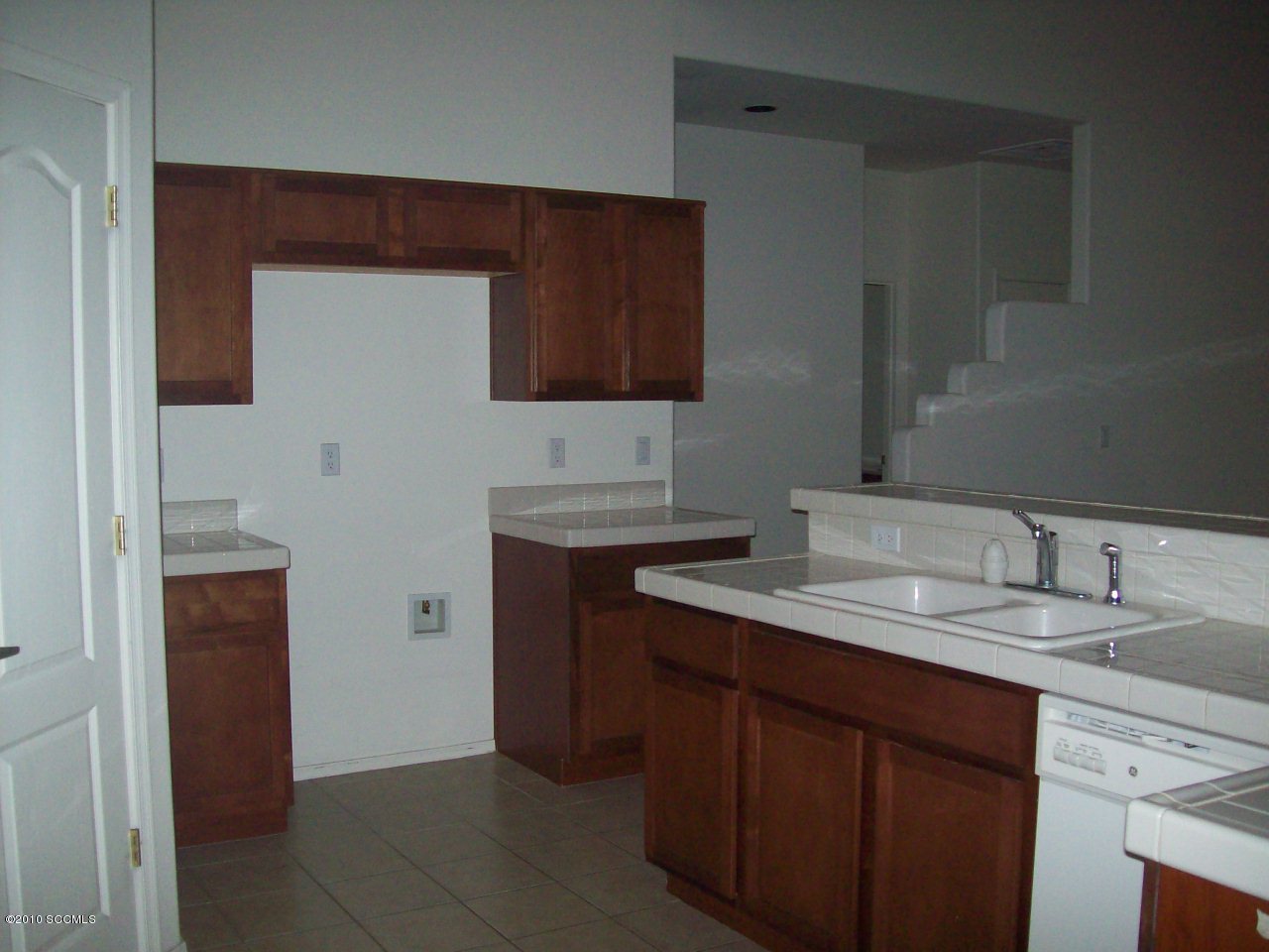 313 Via Bella Donna Rio Rico, AZ 85648 - Photo 5 of 7 a bathroom with a sink and a mirror