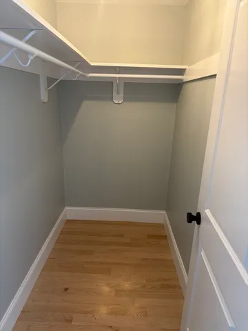 a view of a room with racks on the wall