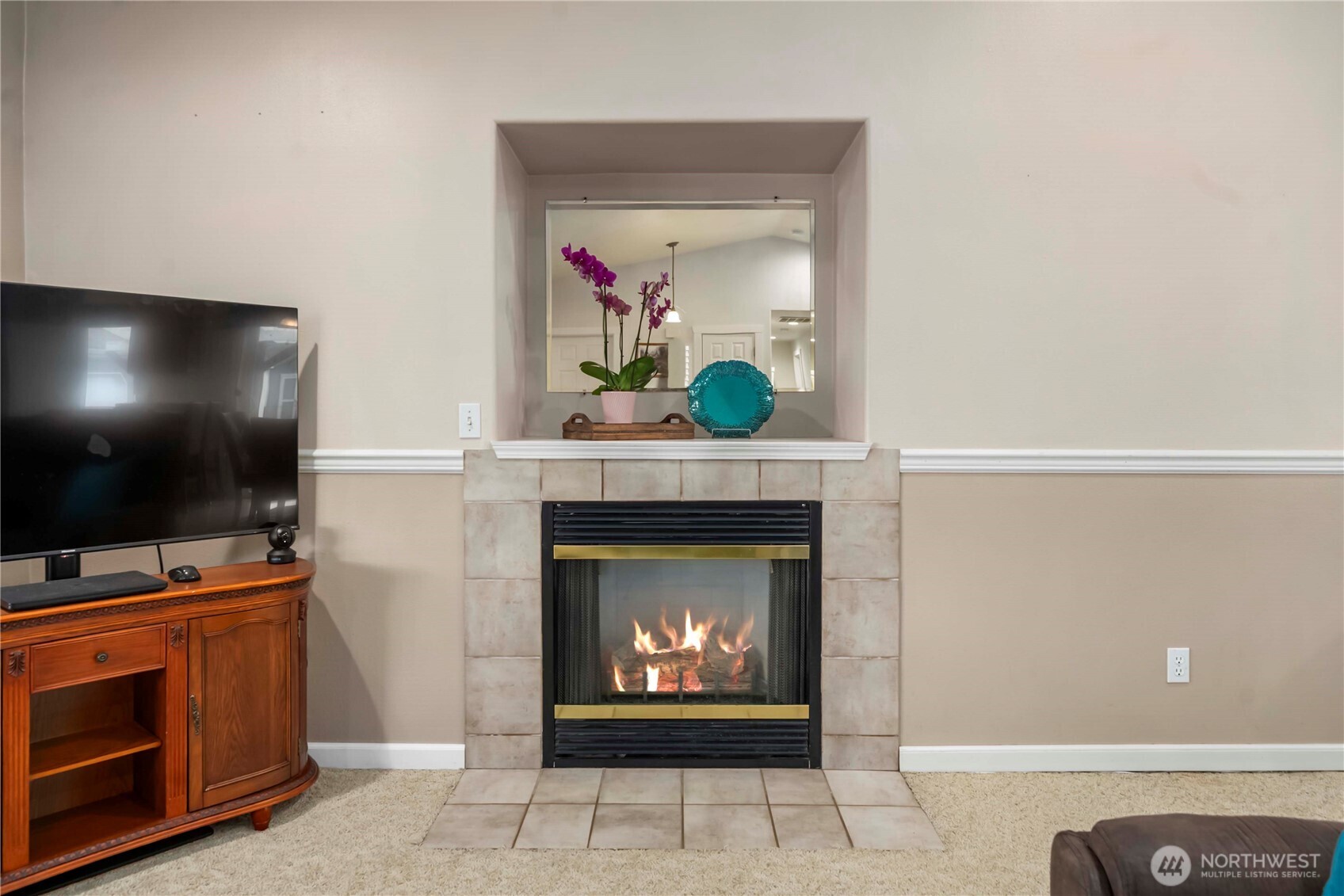 1010 Academy Street Sumner, WA 98390 - Photo 10 of 37 a living room with fireplace and a fireplace