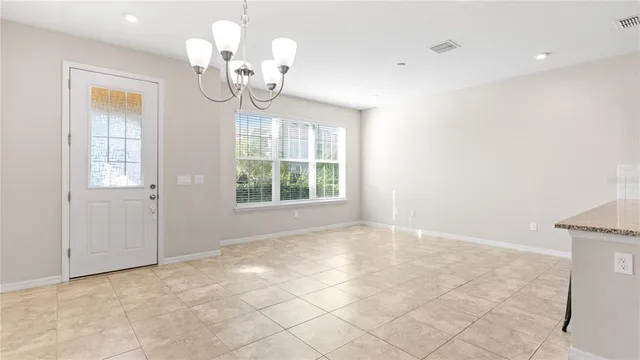 en view of an empty room with a window