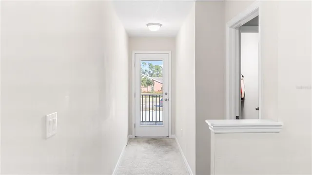 a view of a balcony with wooden floor