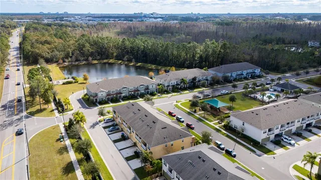 an aerial view of a house with lake view