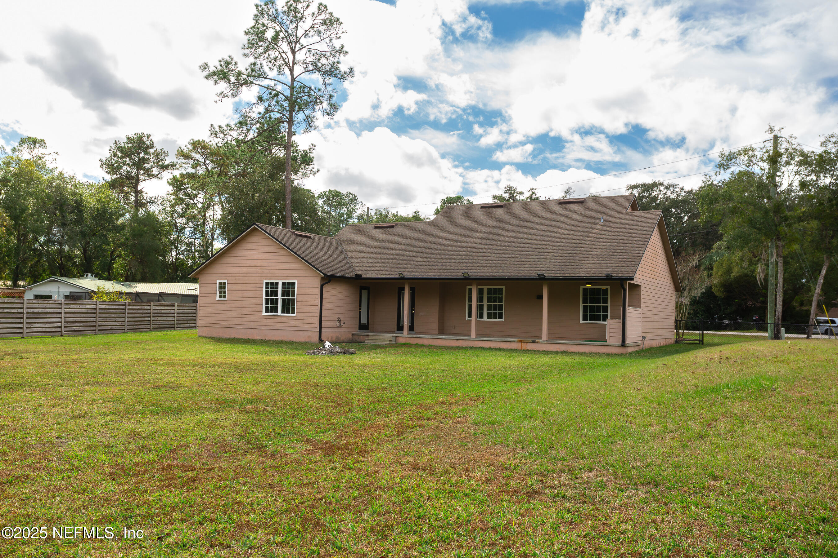 194 Horseman Club Road Palatka, FL 32177 - Photo 26 of 27 a view of a yard in front of a house with a yard