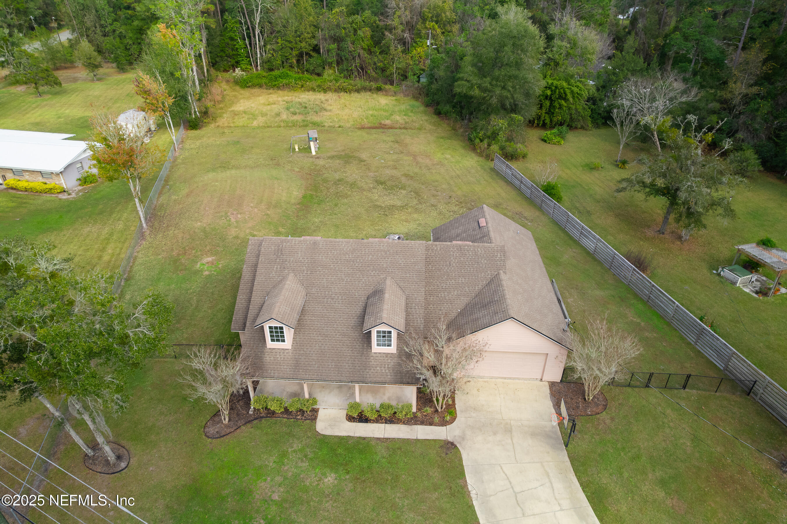 194 Horseman Club Road Palatka, FL 32177 - Photo 5 of 27 a aerial view of a house with a yard
