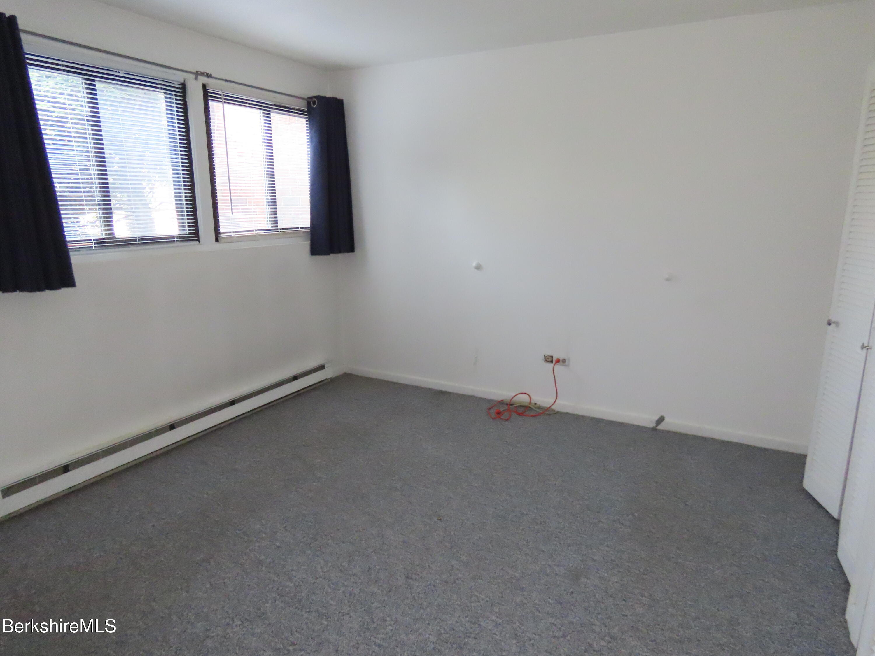 189 Stratton Road, Unit C4 Williamstown, MA 01267 - Photo 17 of 28 an empty room with a window