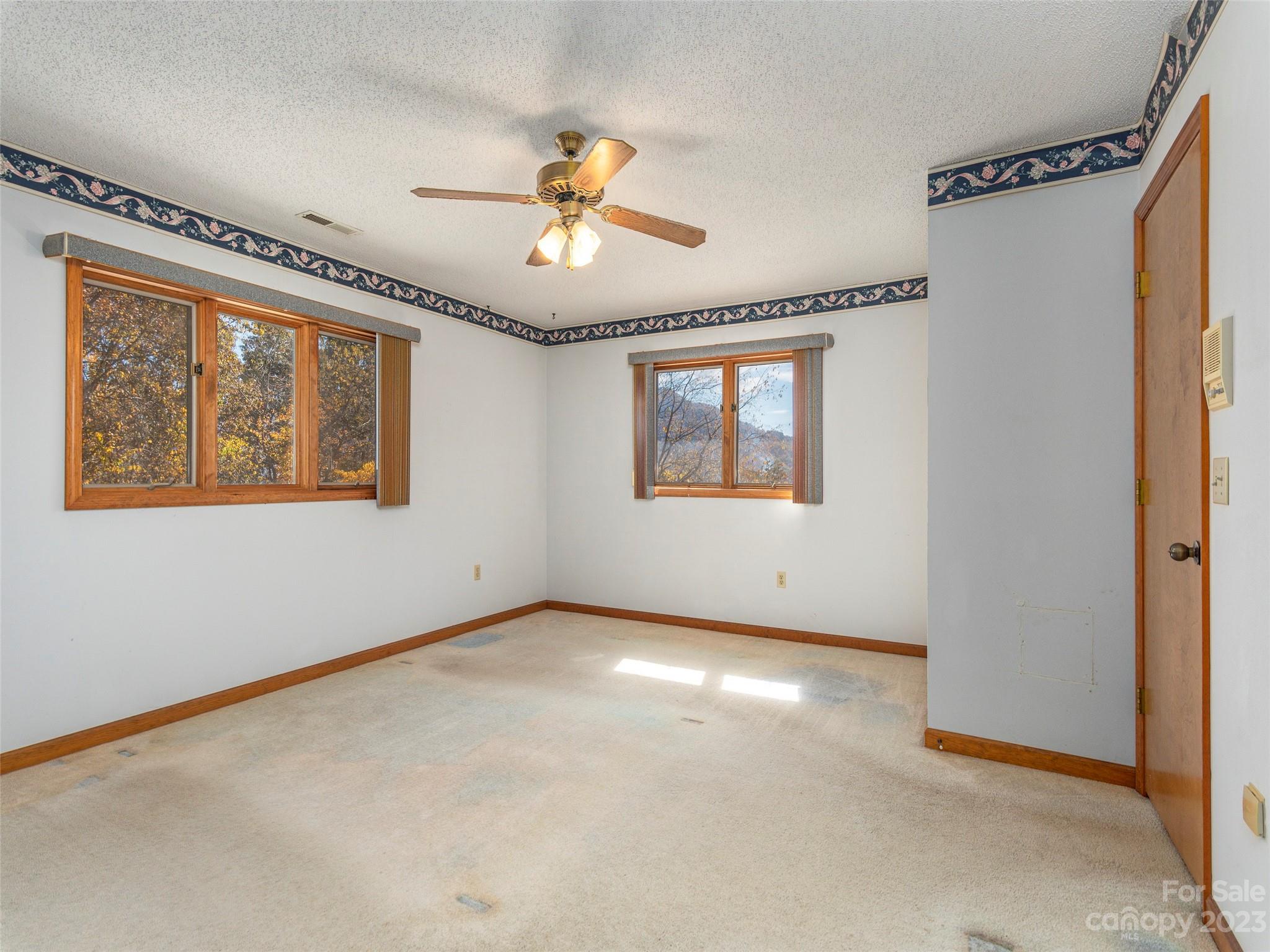 256 Goldfinch Lane Clyde, NC 28721 - Photo 19 of 31 a view of an empty room with a window