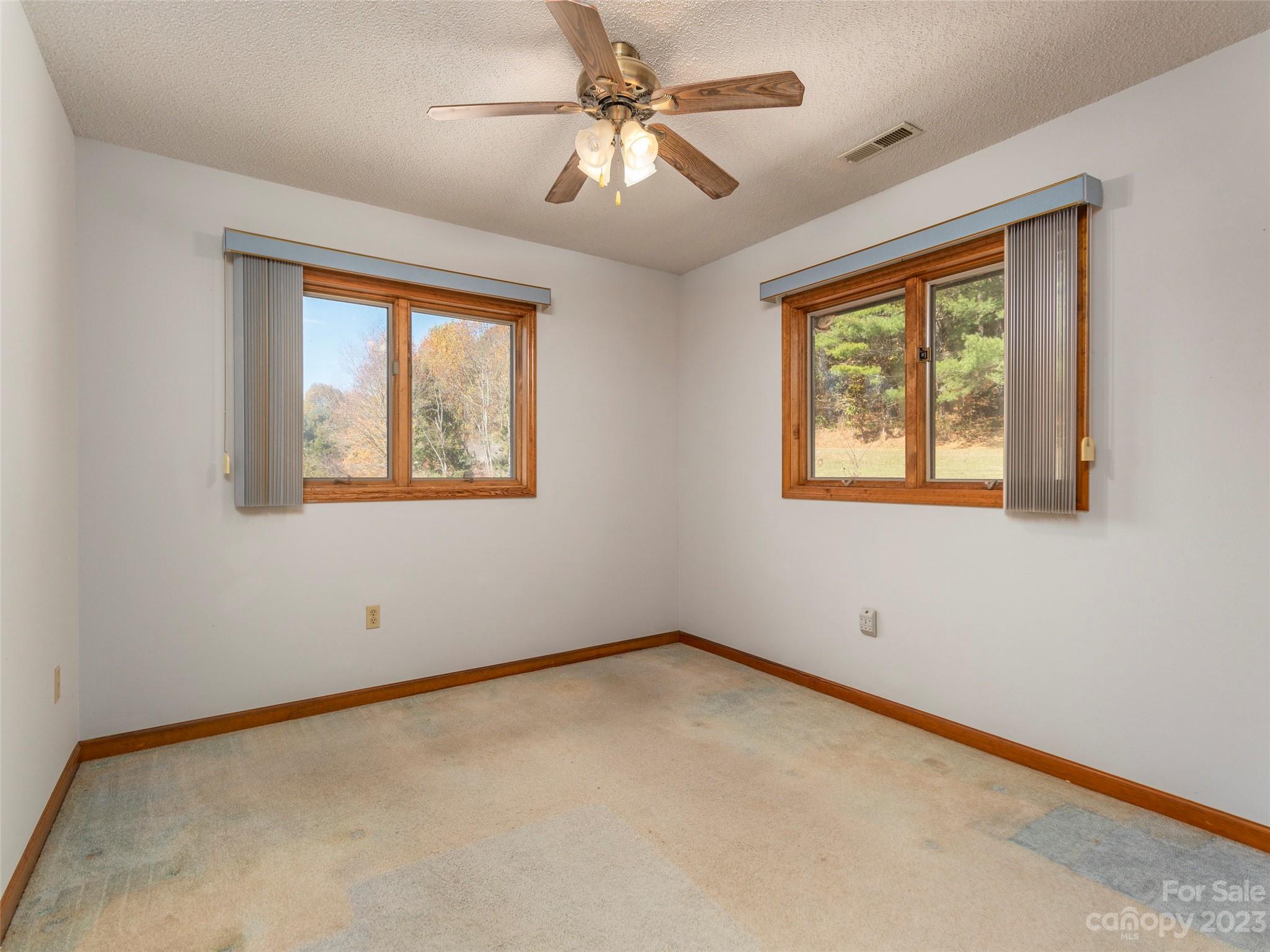 256 Goldfinch Lane Clyde, NC 28721 - Photo 23 of 31 a view of an empty room with a window