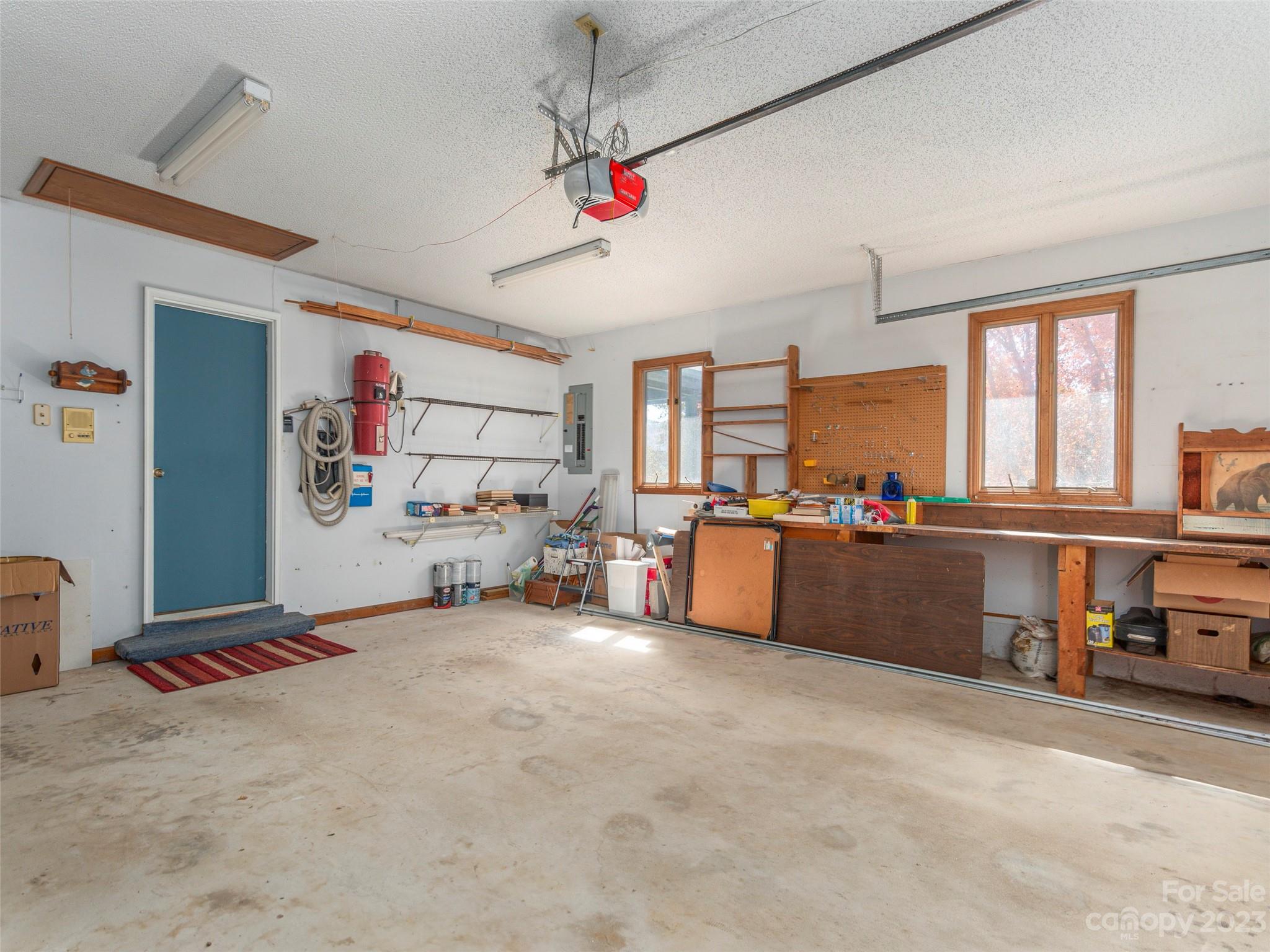 256 Goldfinch Lane Clyde, NC 28721 - Photo 24 of 31 a view of a room with gym equipment and a window