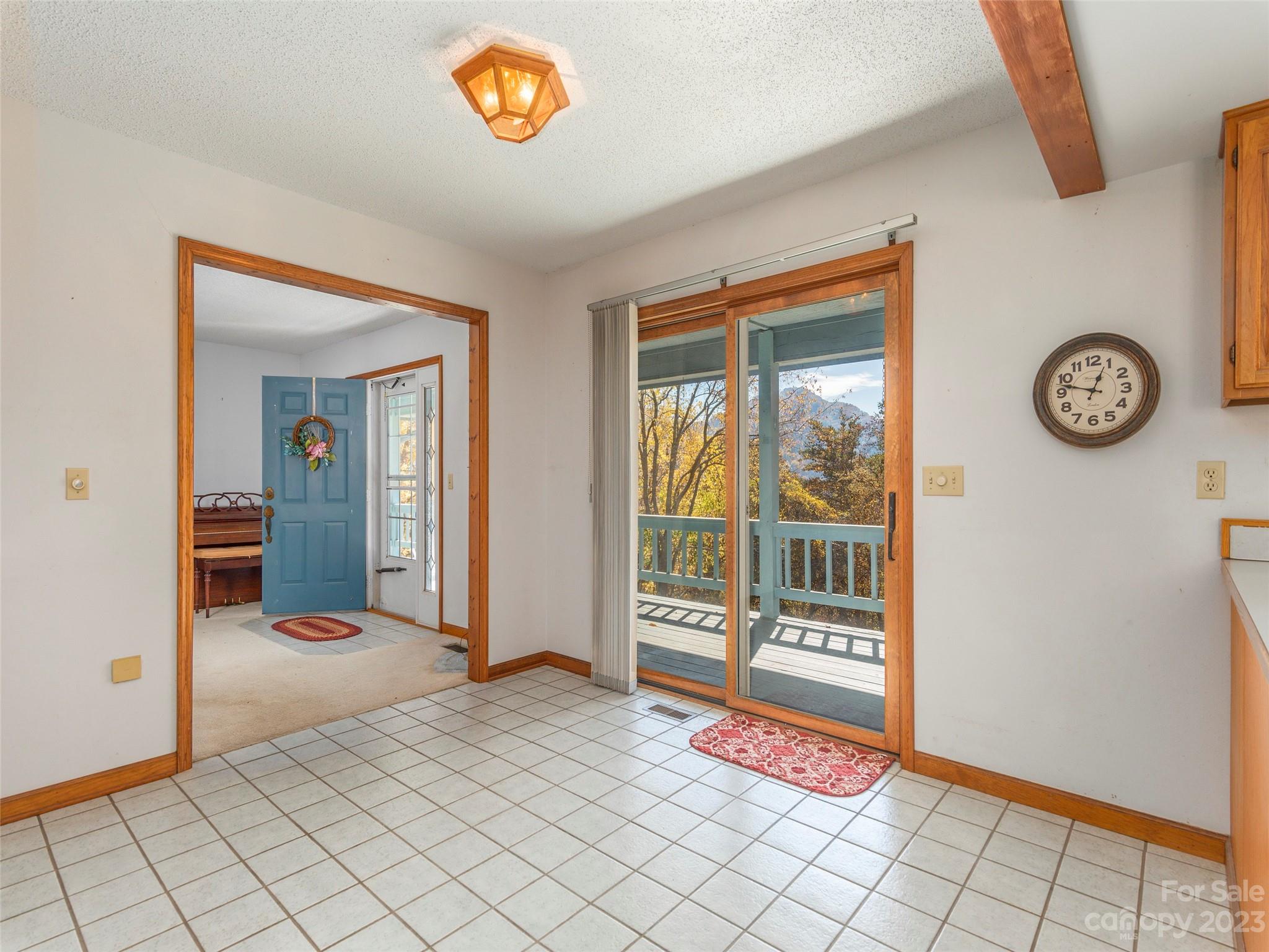256 Goldfinch Lane Clyde, NC 28721 - Photo 6 of 31 a view of an entryway with wooden floor