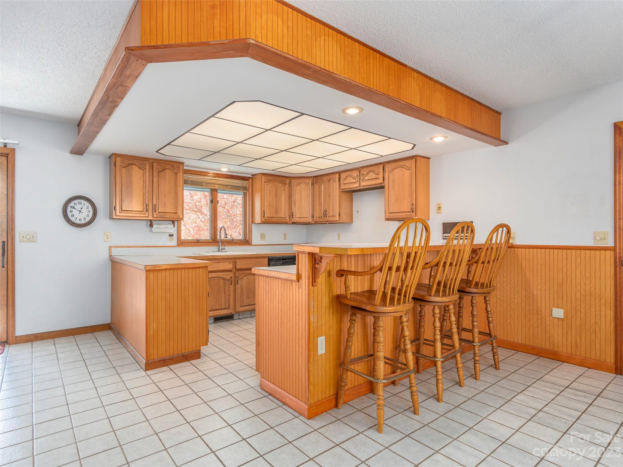 256 Goldfinch Lane Clyde, NC 28721 - Photo 10 of 31 a dinning table and chairs in a room