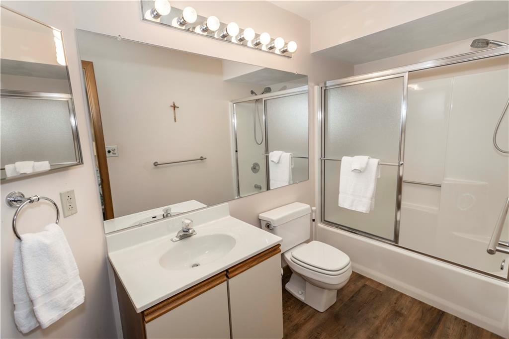 G11 Sunridge Road Champion, PA 15622 - Photo 24 of 30 a bathroom with a sink toilet a mirror and shower