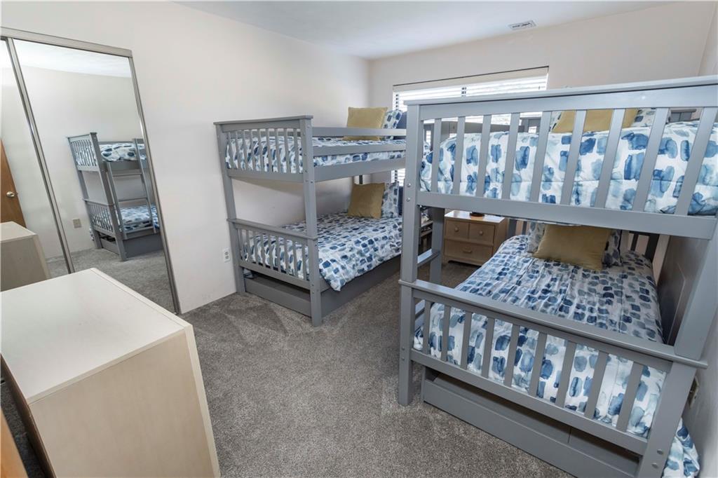 G11 Sunridge Road Champion, PA 15622 - Photo 26 of 30 a bedroom with furniture and a baby crib