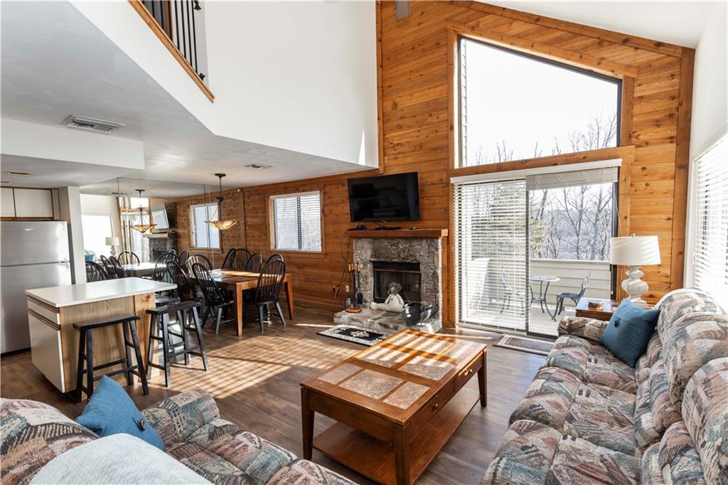 G11 Sunridge Road Champion, PA 15622 - Photo 3 of 30 a living room with furniture a large window and a fireplace