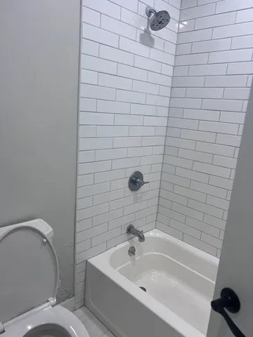 a bathroom with a sink and bathtub