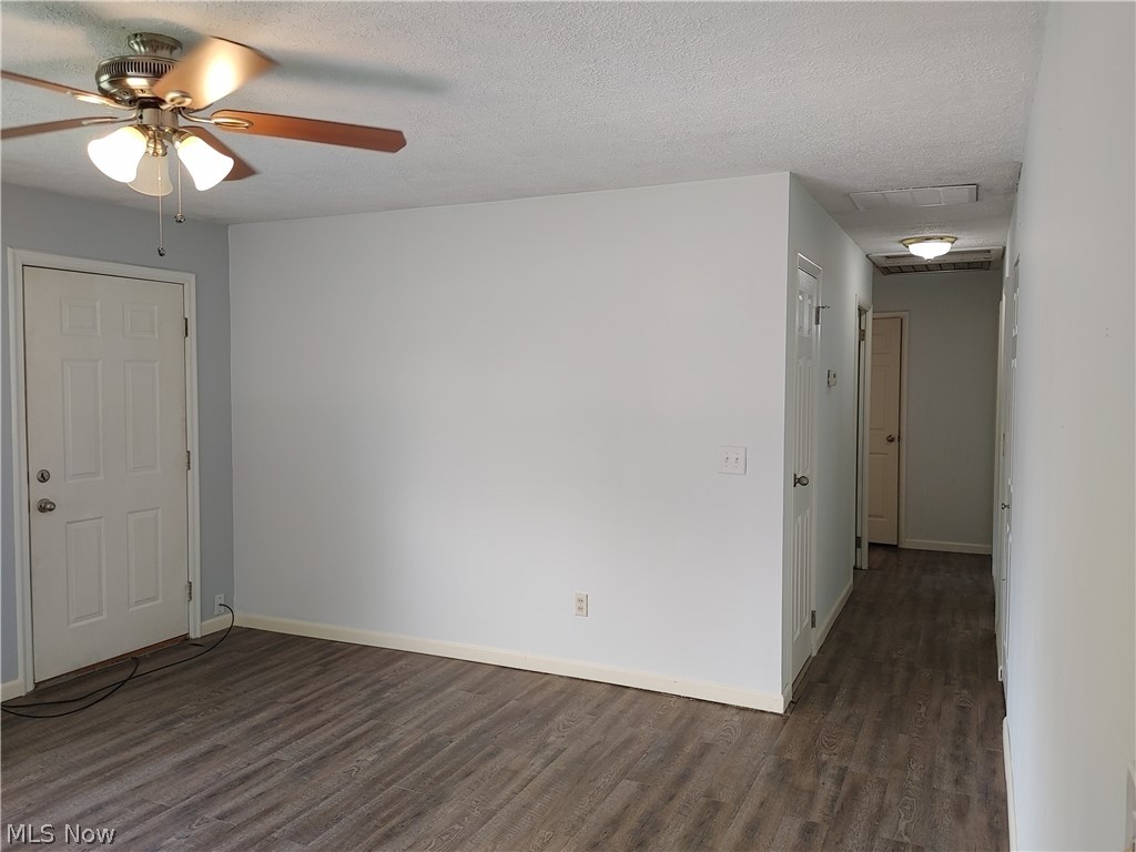 701 Abbe Road North Elyria, OH 44035 - Photo 14 of 23 Living room - hallway leads to bedrooms and main bathroom