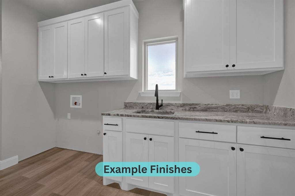 0 City Lake Road Canyon, TX 79015 - Photo 24 of 31 a kitchen with granite countertop white cabinets and a sink