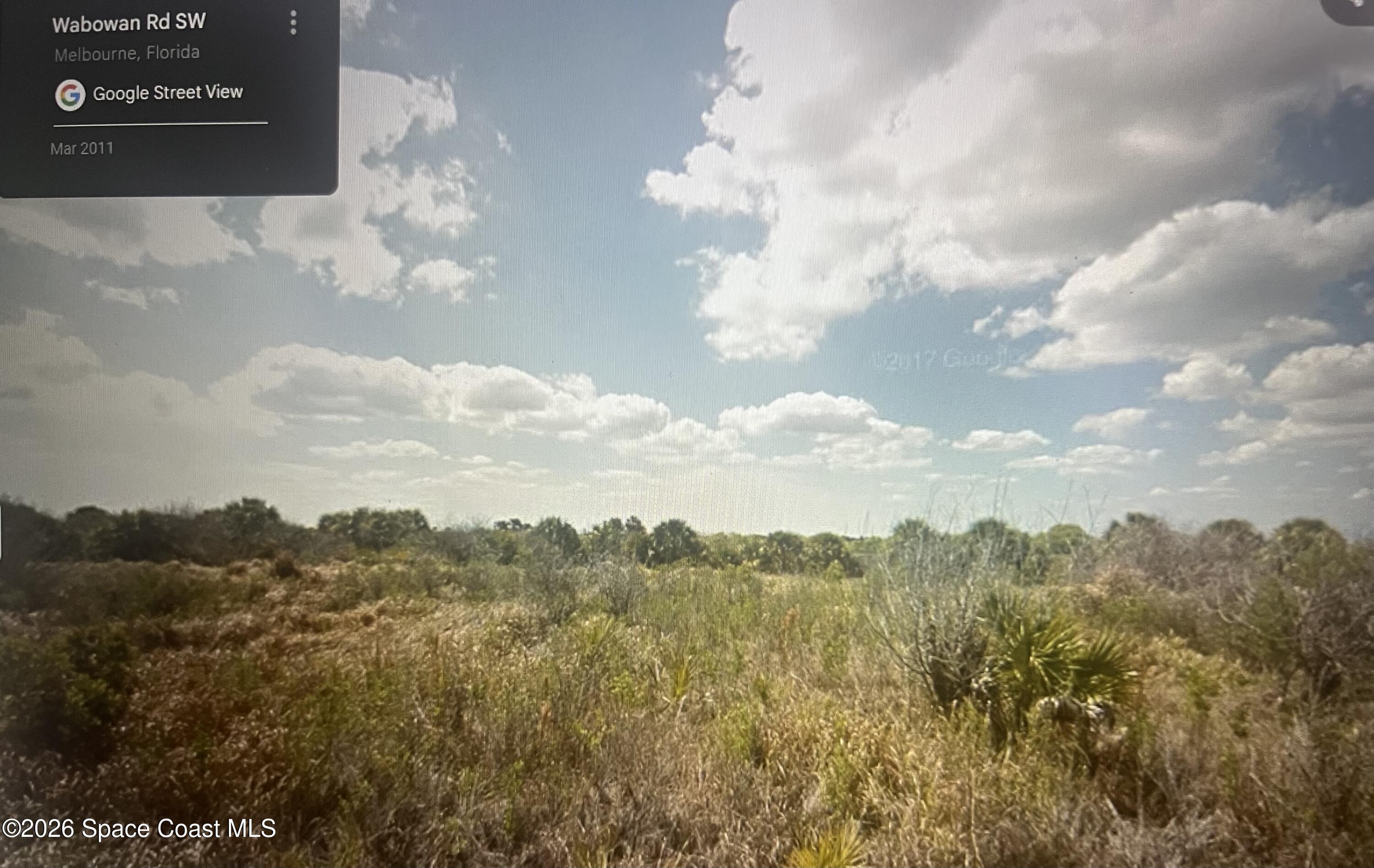 2140 Wabowen Road Palm Bay, FL 32908 - Photo 2 of 2 a view of a sky