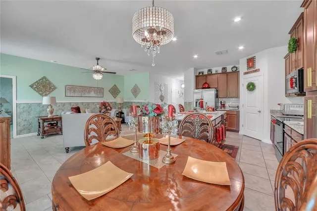 a utility room with cabinets a washer and dryer