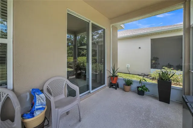 an aerial view of a house with a ocean view
