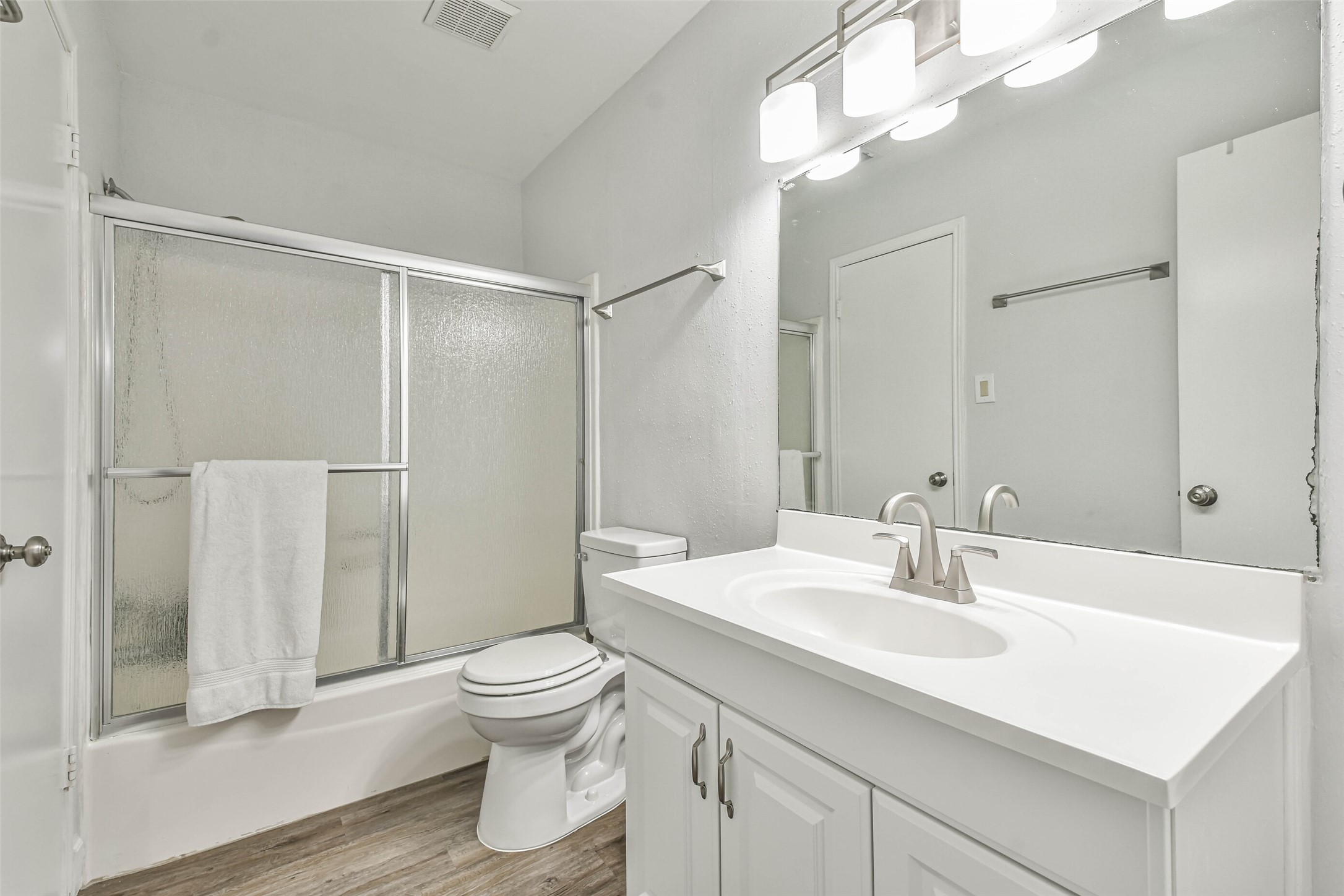 50 April Village Conroe, TX 77356 - Photo 15 of 19 a bathroom with a sink toilet a mirror and shower