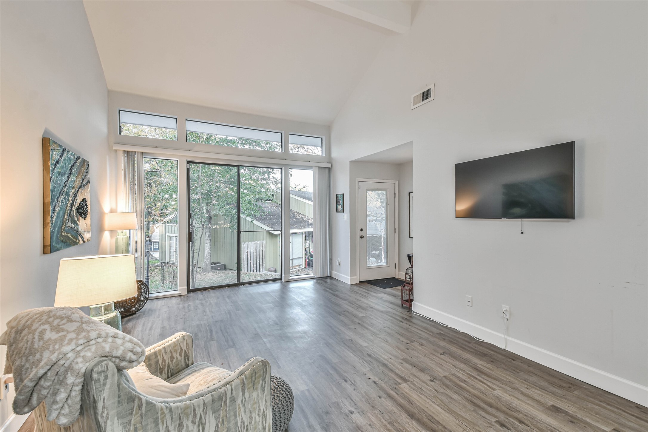 50 April Village Conroe, TX 77356 - Photo 3 of 19 a living room with furniture tv and wooden floor