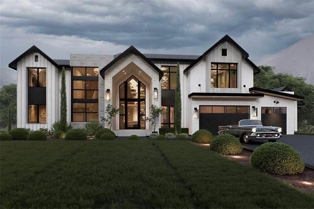 a front view of a house with a garden