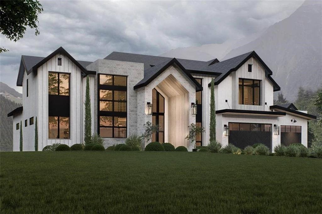 3430 Camp Branch Road Buford, GA 30519 - Photo 4 of 6 a front view of a house with a yard and trees