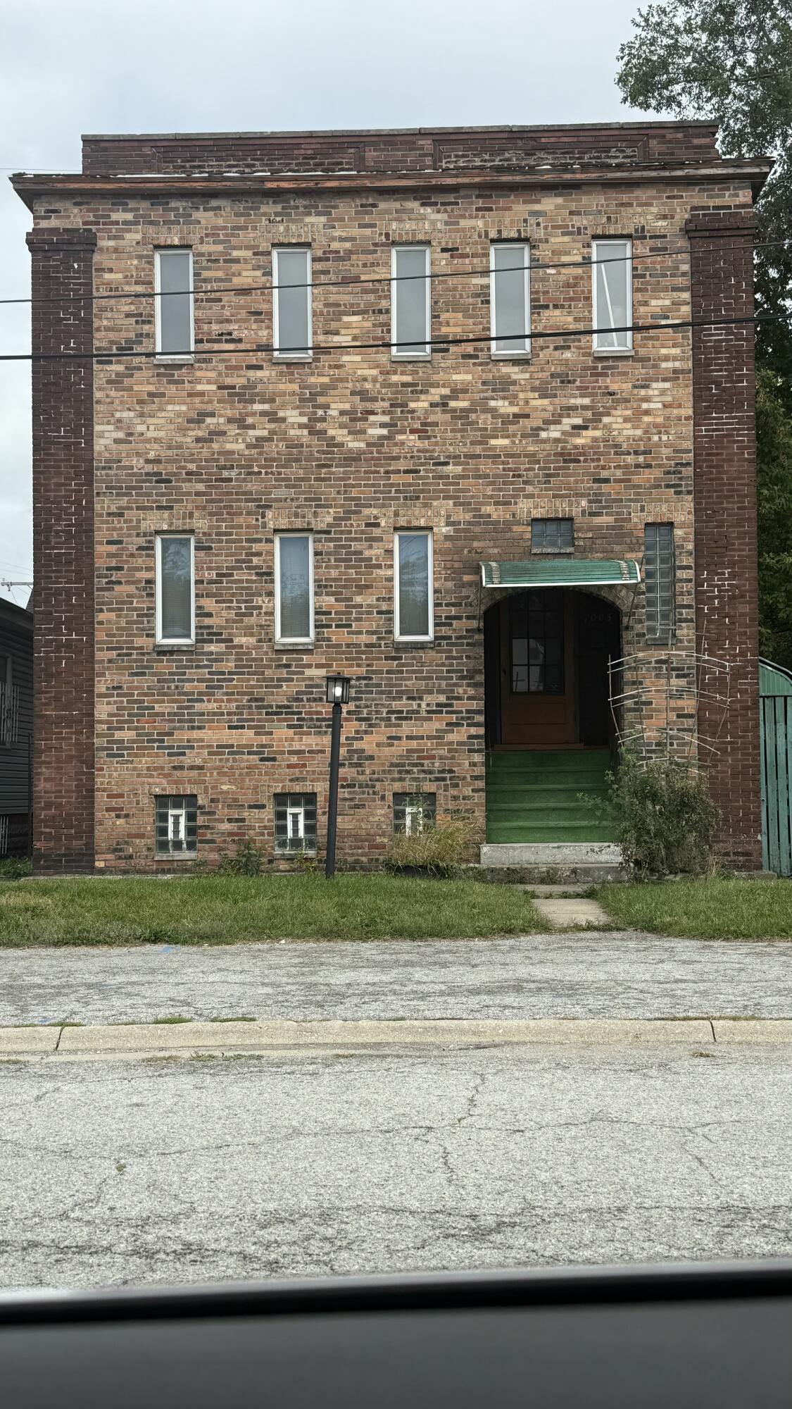 1005 Garfield Street Gary, IN 46404 - Photo 1 of 1 a front view of a house with a yard