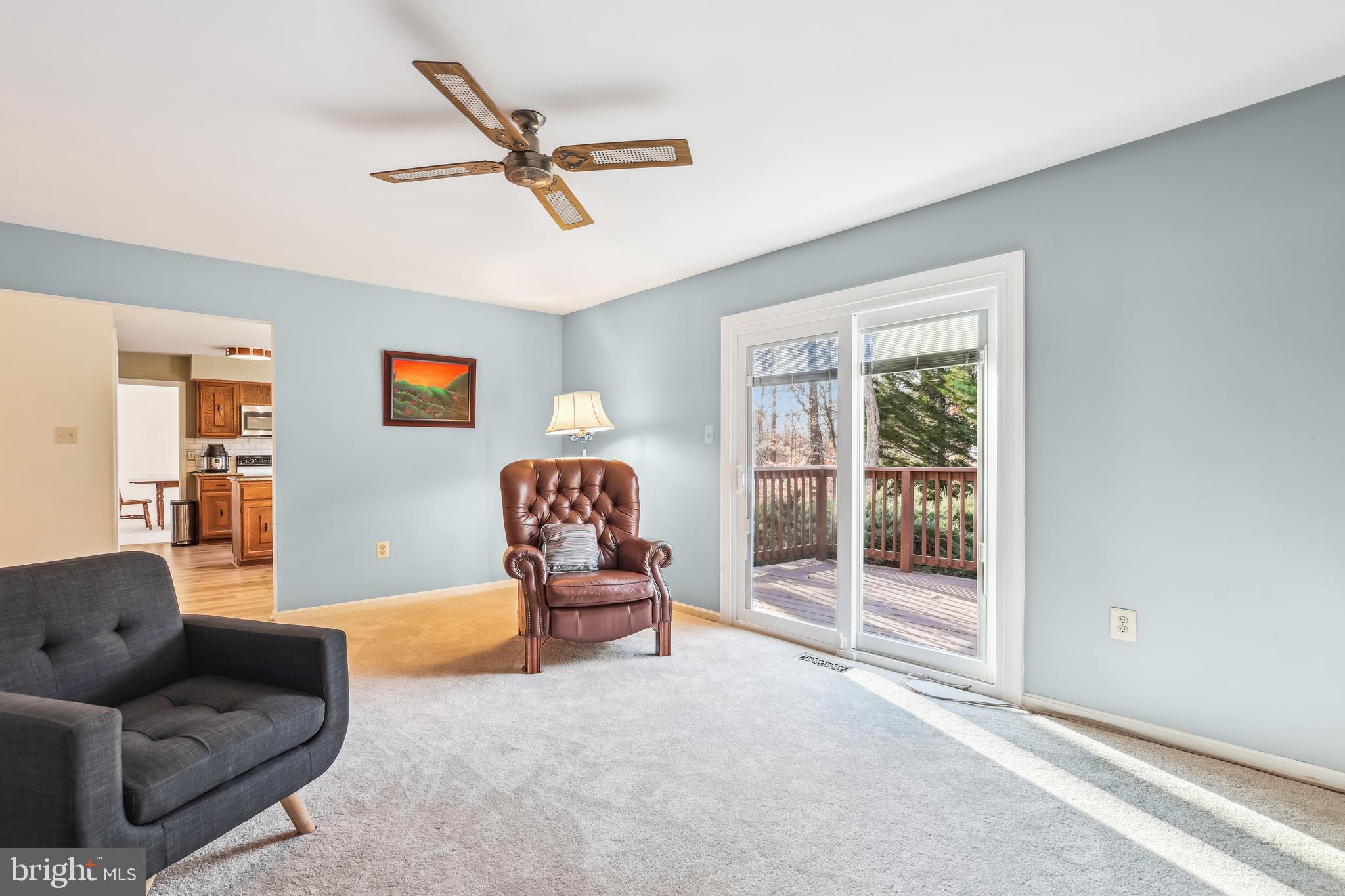 7122 Rolling Forest Avenue Springfield, VA 22152 - Photo 20 of 58 a living room with furniture and a window