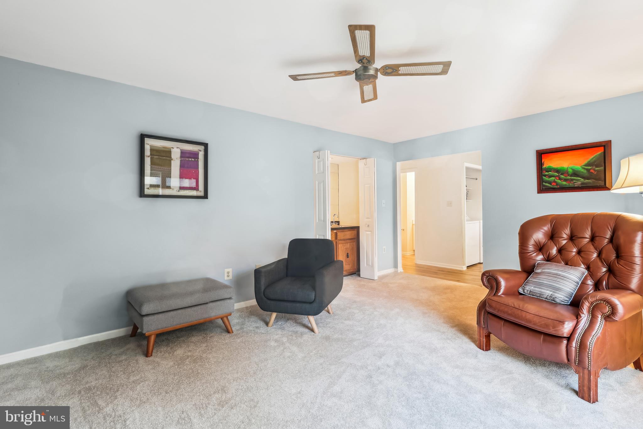 7122 Rolling Forest Avenue Springfield, VA 22152 - Photo 21 of 58 a living room with furniture and a window