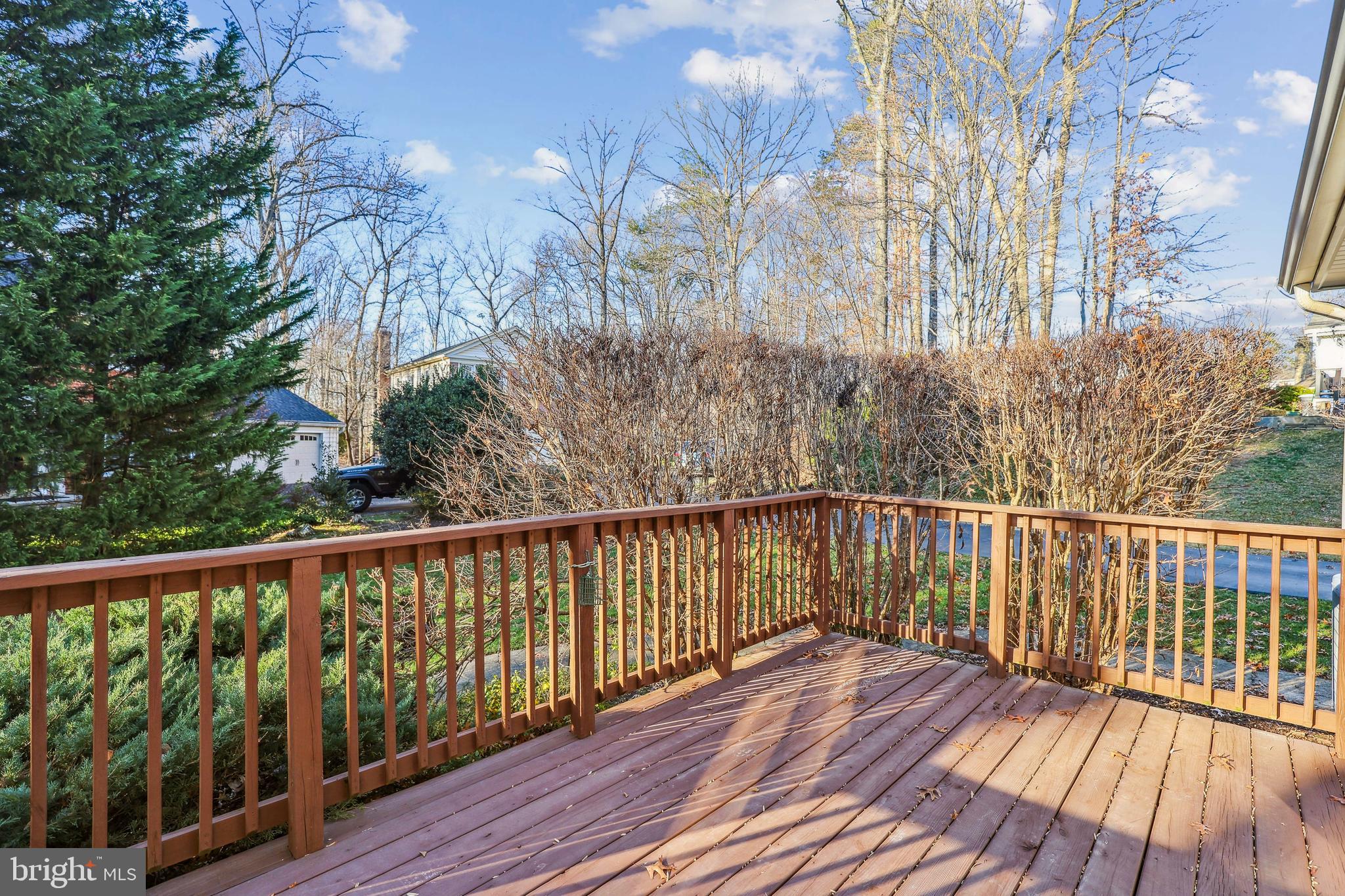 7122 Rolling Forest Avenue Springfield, VA 22152 - Photo 23 of 58 a view of balcony with wooden floor