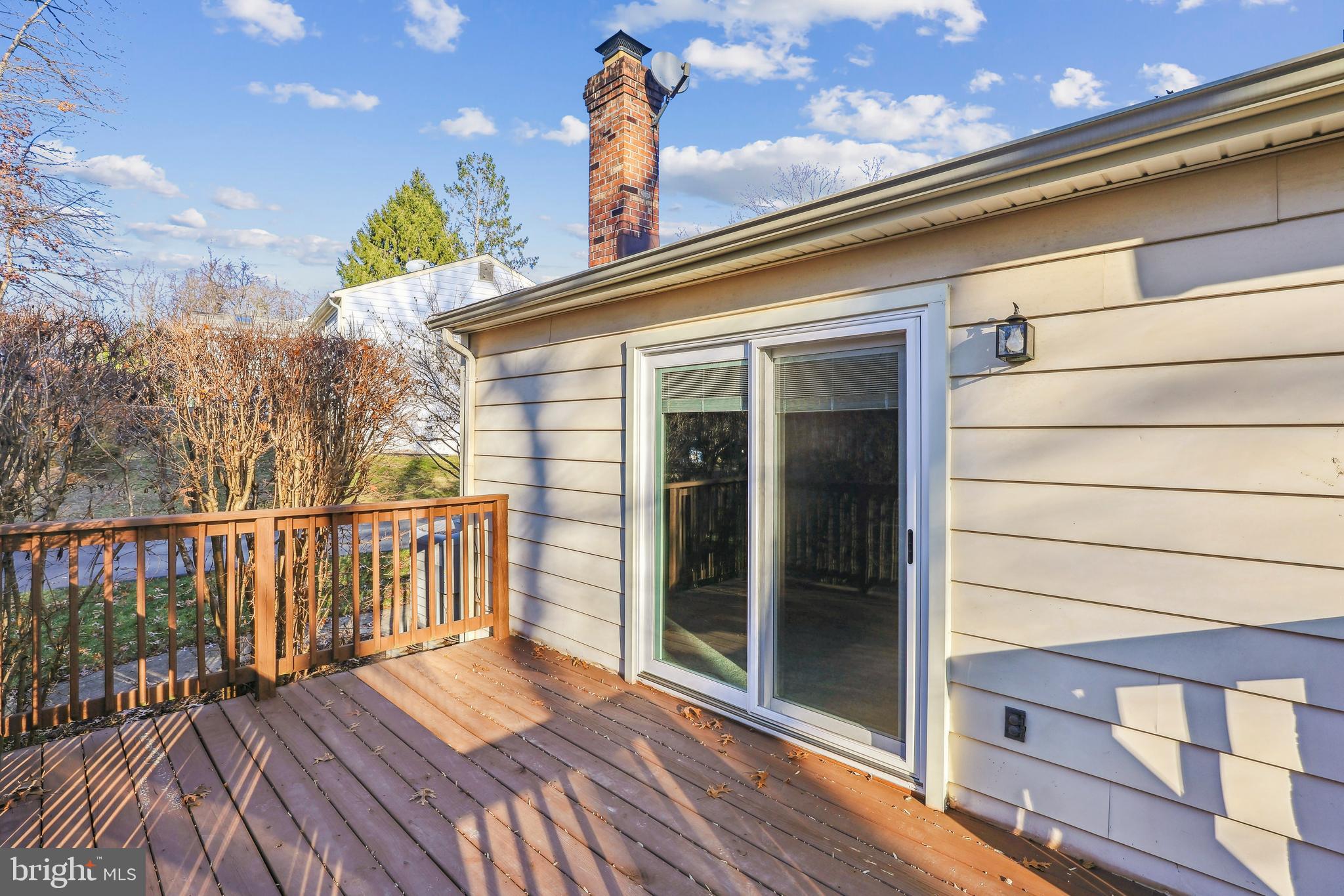 7122 Rolling Forest Avenue Springfield, VA 22152 - Photo 24 of 58 a view of a balcony with wooden floor