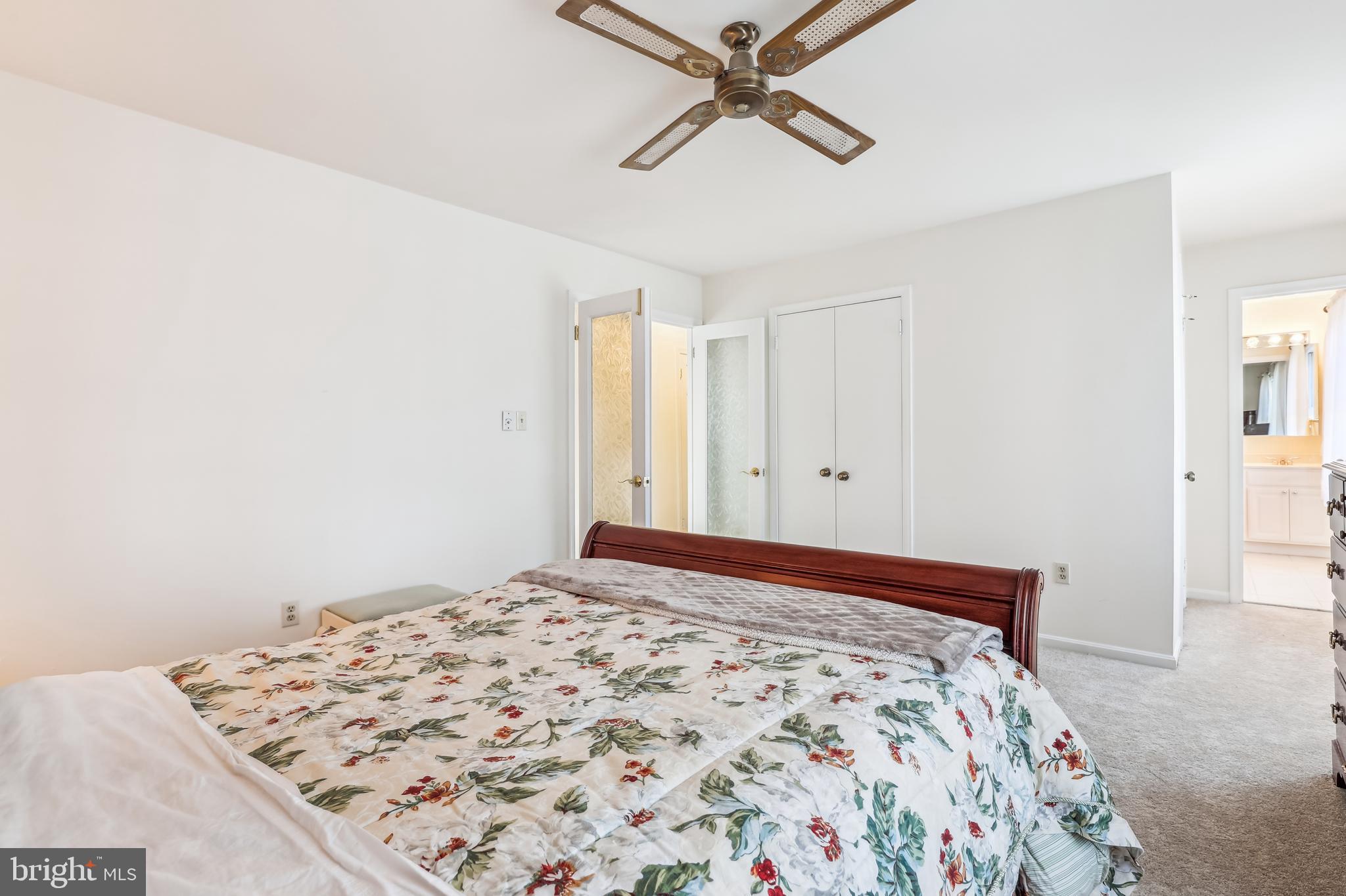 7122 Rolling Forest Avenue Springfield, VA 22152 - Photo 31 of 58 a bedroom with a bed and a window