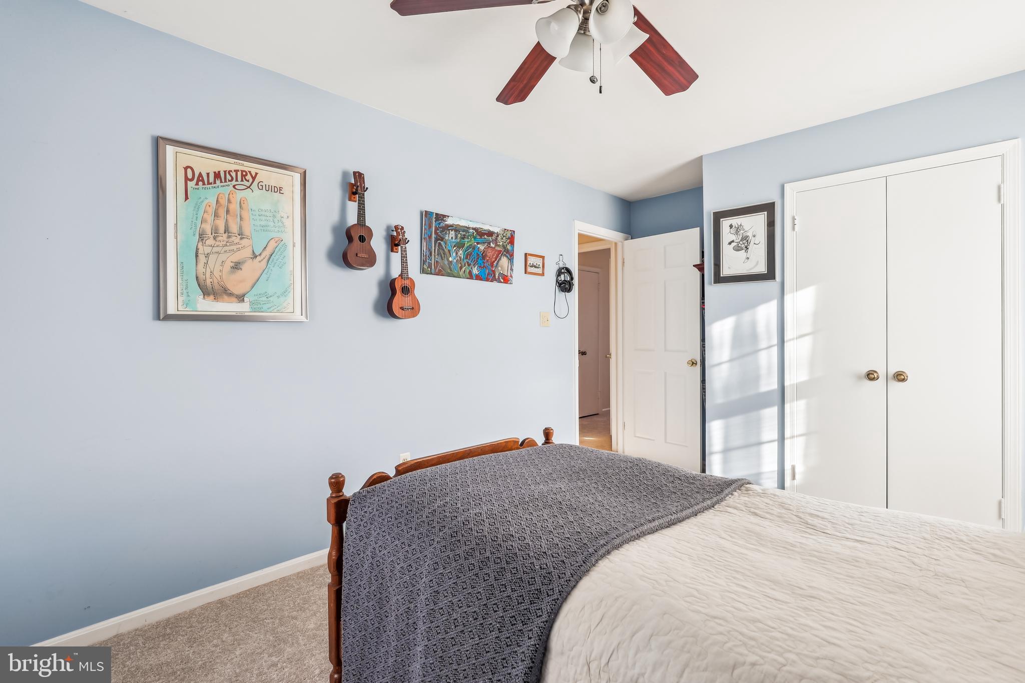 7122 Rolling Forest Avenue Springfield, VA 22152 - Photo 35 of 58 a bedroom with a bed and a window