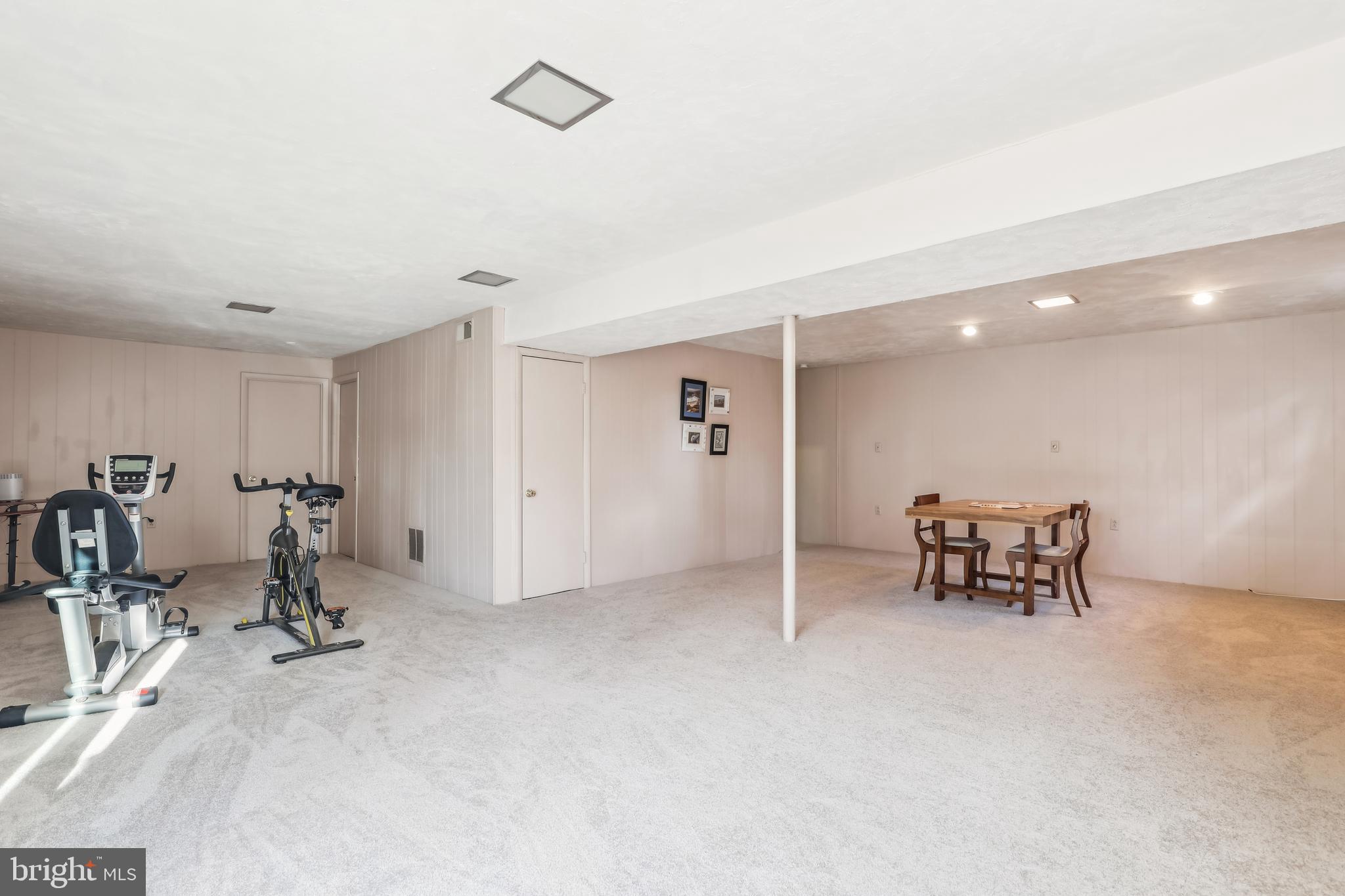 7122 Rolling Forest Avenue Springfield, VA 22152 - Photo 45 of 58 a view of a room with gym equipment