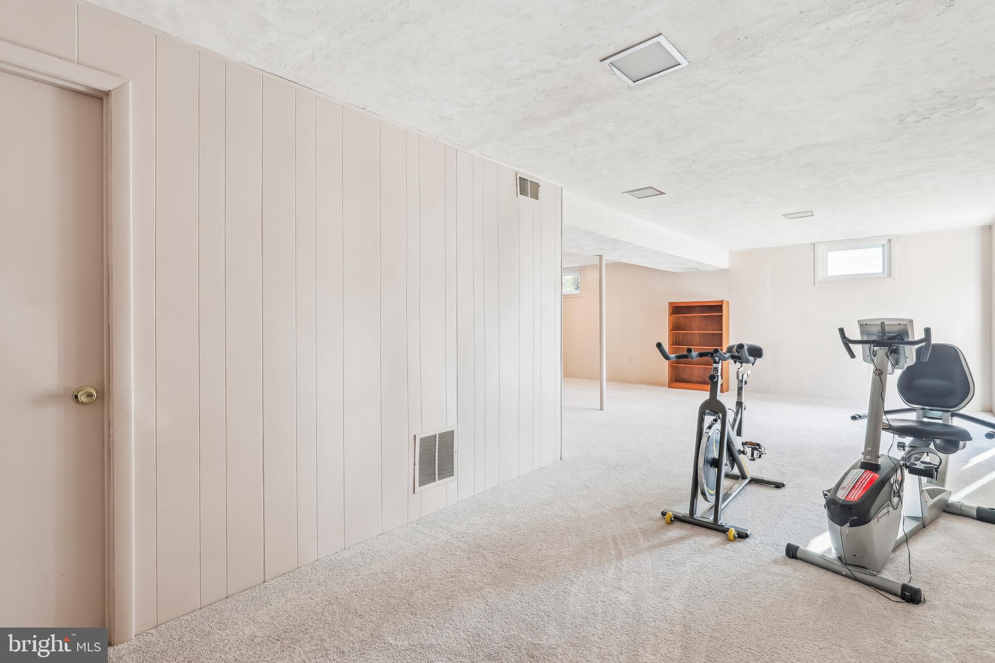 7122 Rolling Forest Avenue Springfield, VA 22152 - Photo 47 of 58 a view of a room with gym equipment