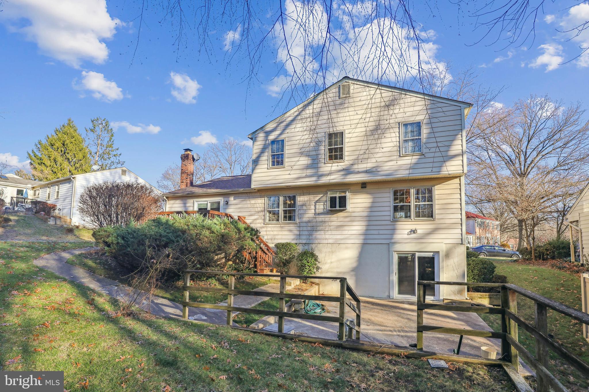 7122 Rolling Forest Avenue Springfield, VA 22152 - Photo 52 of 58 a front view of a house with a yard