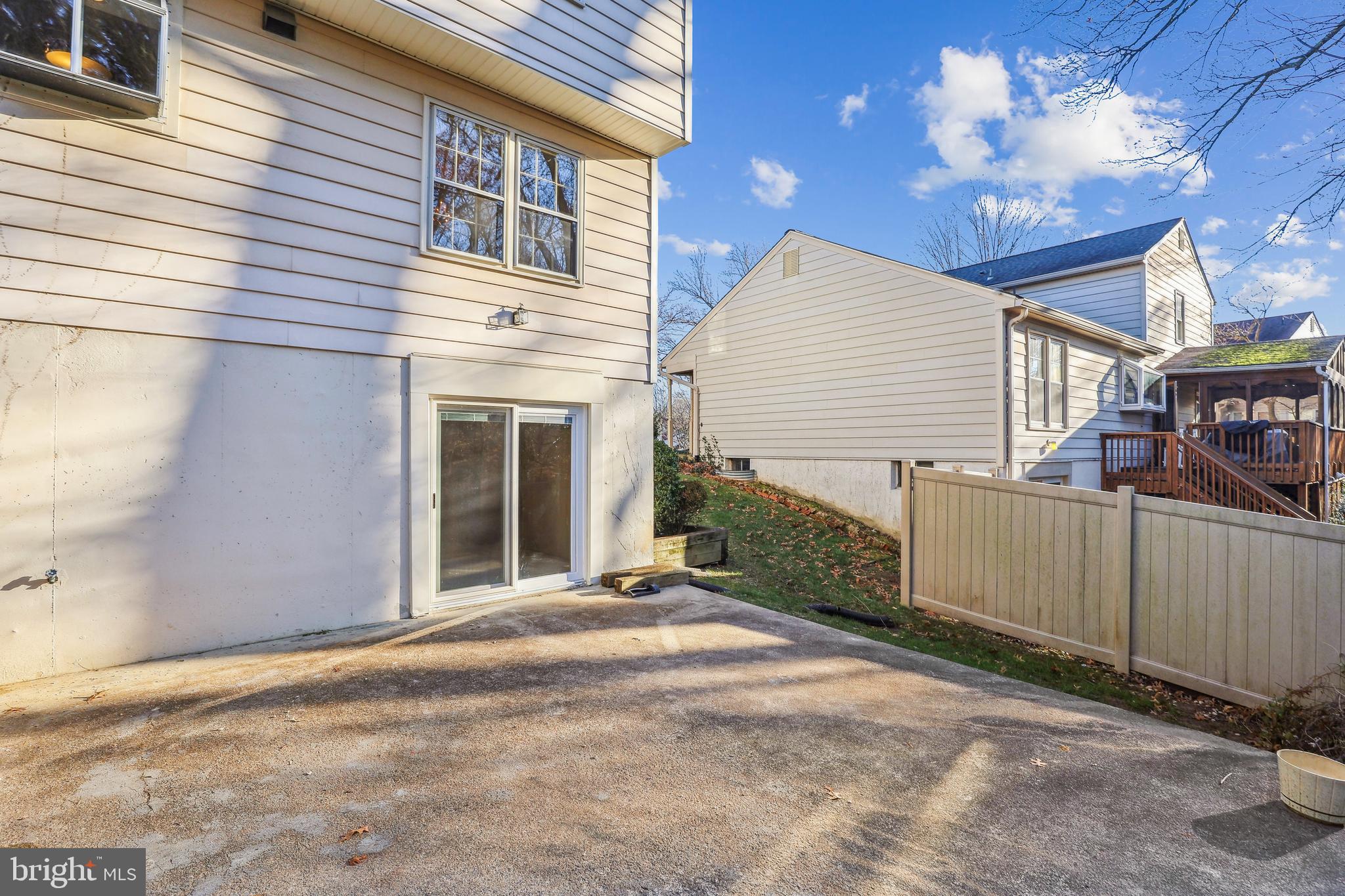 7122 Rolling Forest Avenue Springfield, VA 22152 - Photo 54 of 58 a front view of a house with a garage